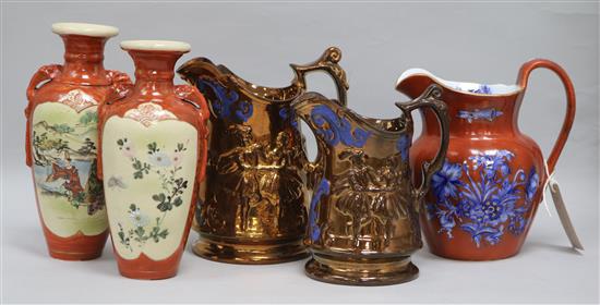 Two Victorian copper lustre jugs, a pair of vases and a jug